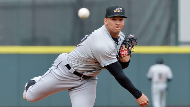 Akron RubberDucks pitcher Daniel Espino warms up between innings against the Erie SeaWolves at UPMC Park in Erie on April 9, 2022.